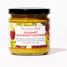 Jar of New Canaan Farms Gourmet Raspberry Mustard on a white background
