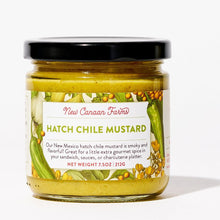 Jar of New Canaan Farms Hatch Chile Mustard on a white background