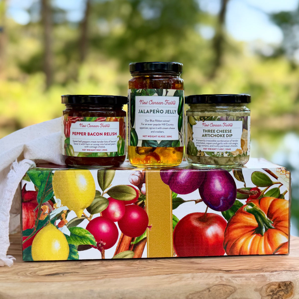New Canaan Farms Host's Delight gift box with Pepper Bacon Relish, Jalapeño Jelly and 3 Cheese Artichoke Dip jars