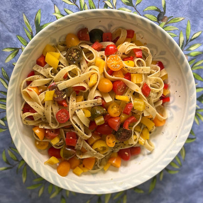Bowl of pasta with seasoning