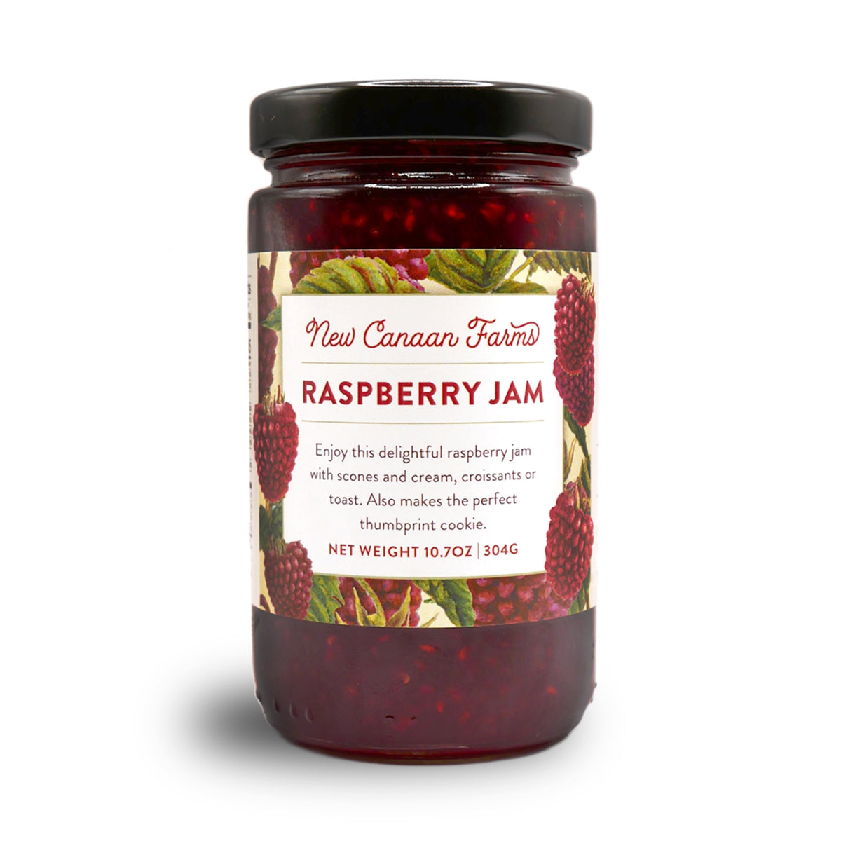 A jar of New Canaan Farms Raspberry Jam on a white background