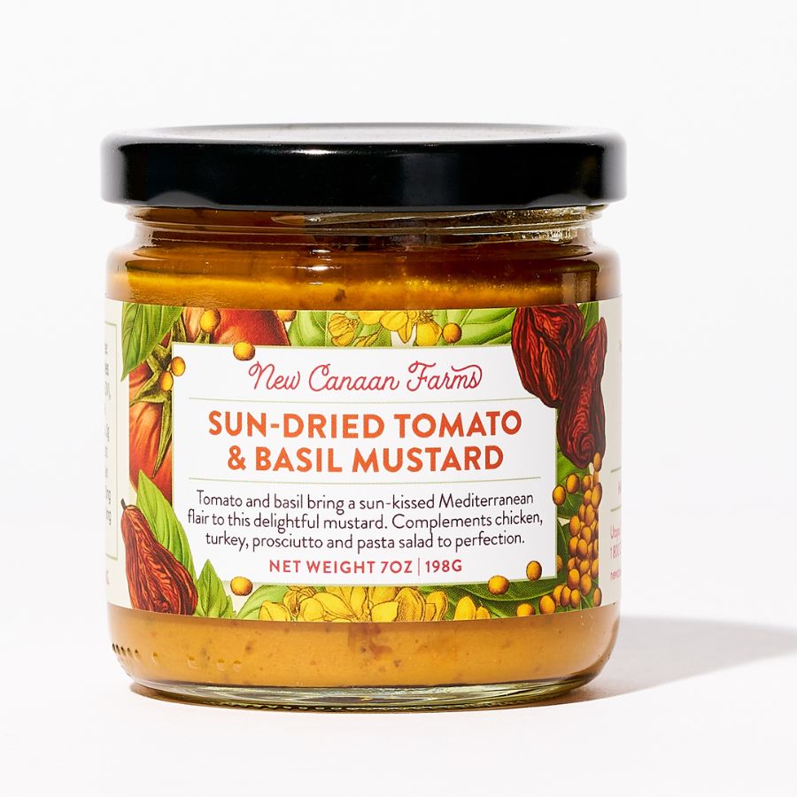 Jar of New Canaan Farms sun-dried tomato and basil mustard on a white background