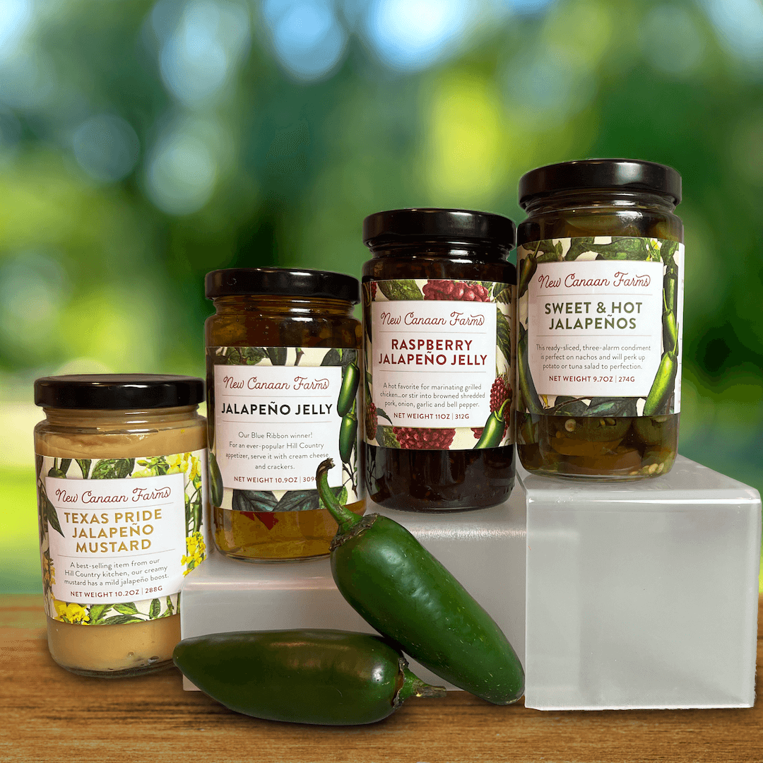 Four fantastic New Canaan Farms jams and condiments that contain jalapeños - Jalepeño Jelly, Texas Pride Jalapeño Mustard, Raspberry Jalepeño Jelly and Sweet & Hot Jalapeños