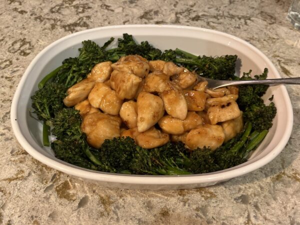 Picture of Apricot chicken on a bed of roasted broccolini