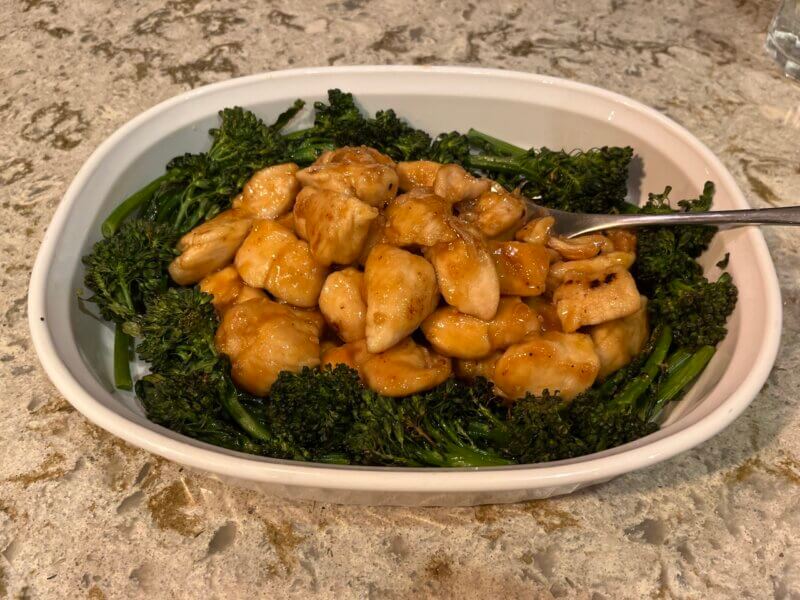 Picture of Apricot chicken on a bed of roasted broccolini
