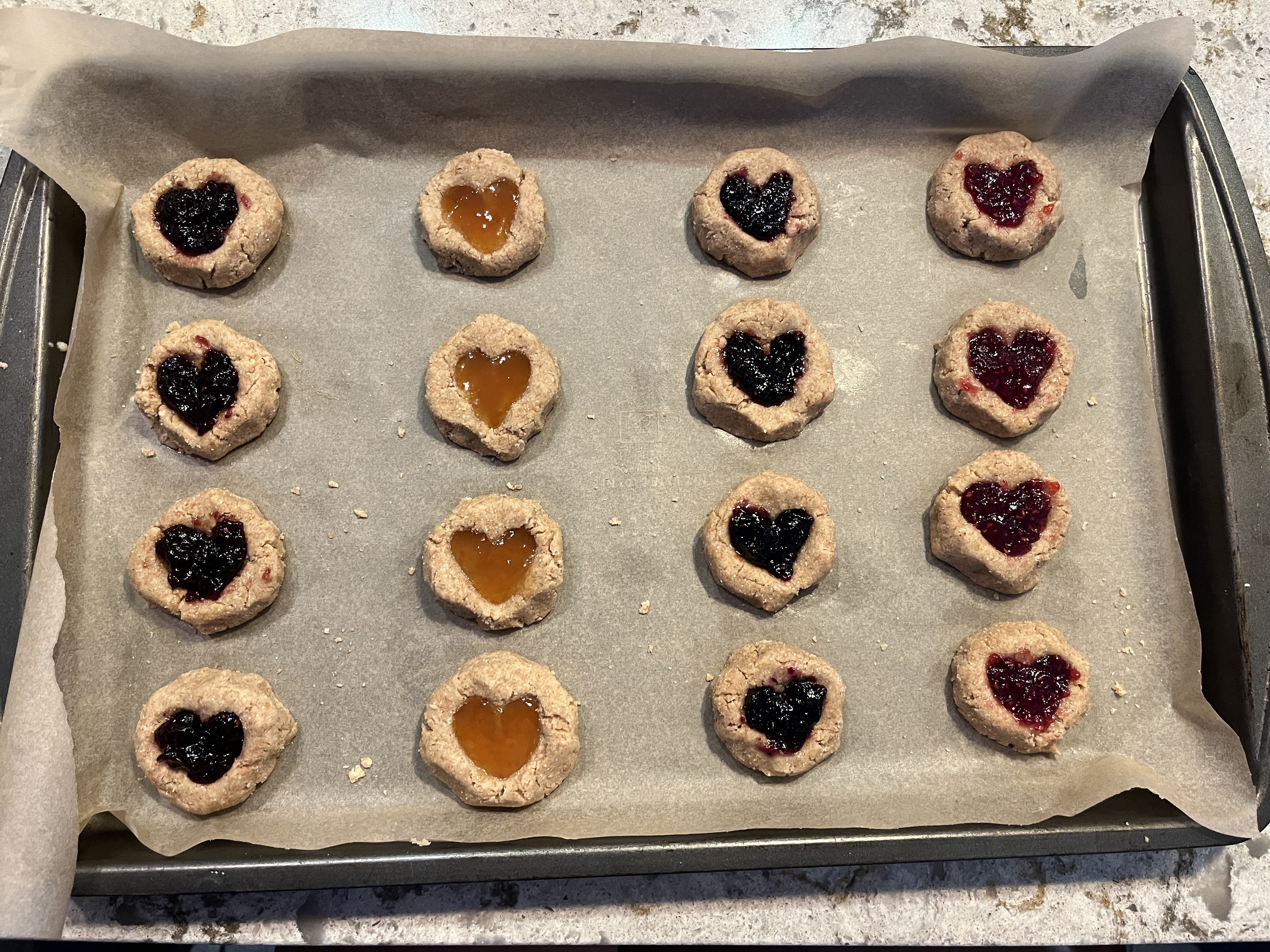 Valentine Thumbprint Cookies using a variety of jams