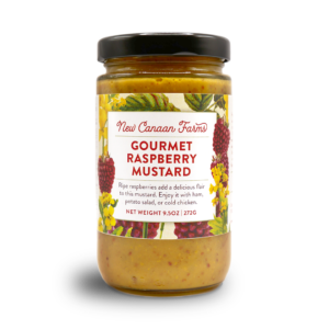 A jar of New Canaan Farms Gourmet Raspberry Mustard