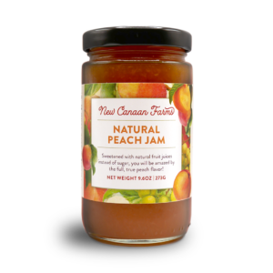 A jar of New Canaan Farms Natural Peach Jam