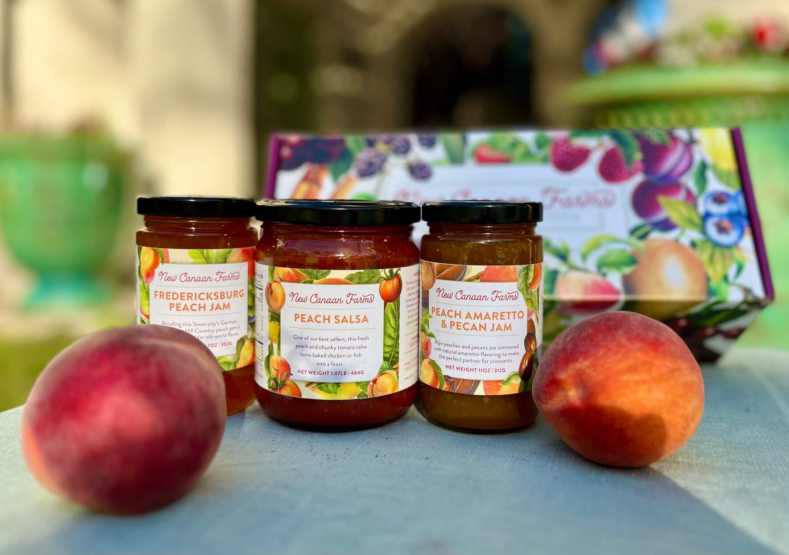 Our three New Canaan Farms peach products with their beautiful gift box; Fredericksburg Peach Jam, Peach Salsa and Peach Amaretto and Pecan Jam
