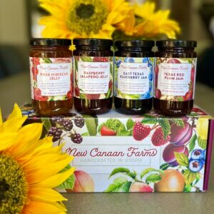 Summer fruits collection of jams in a lovely New Canaan Farms gift box; East Texas Blueberry jam, Rose Hibiscus Jelly, Raspberry Jalapeño Jelly and Texas red Plum Jam