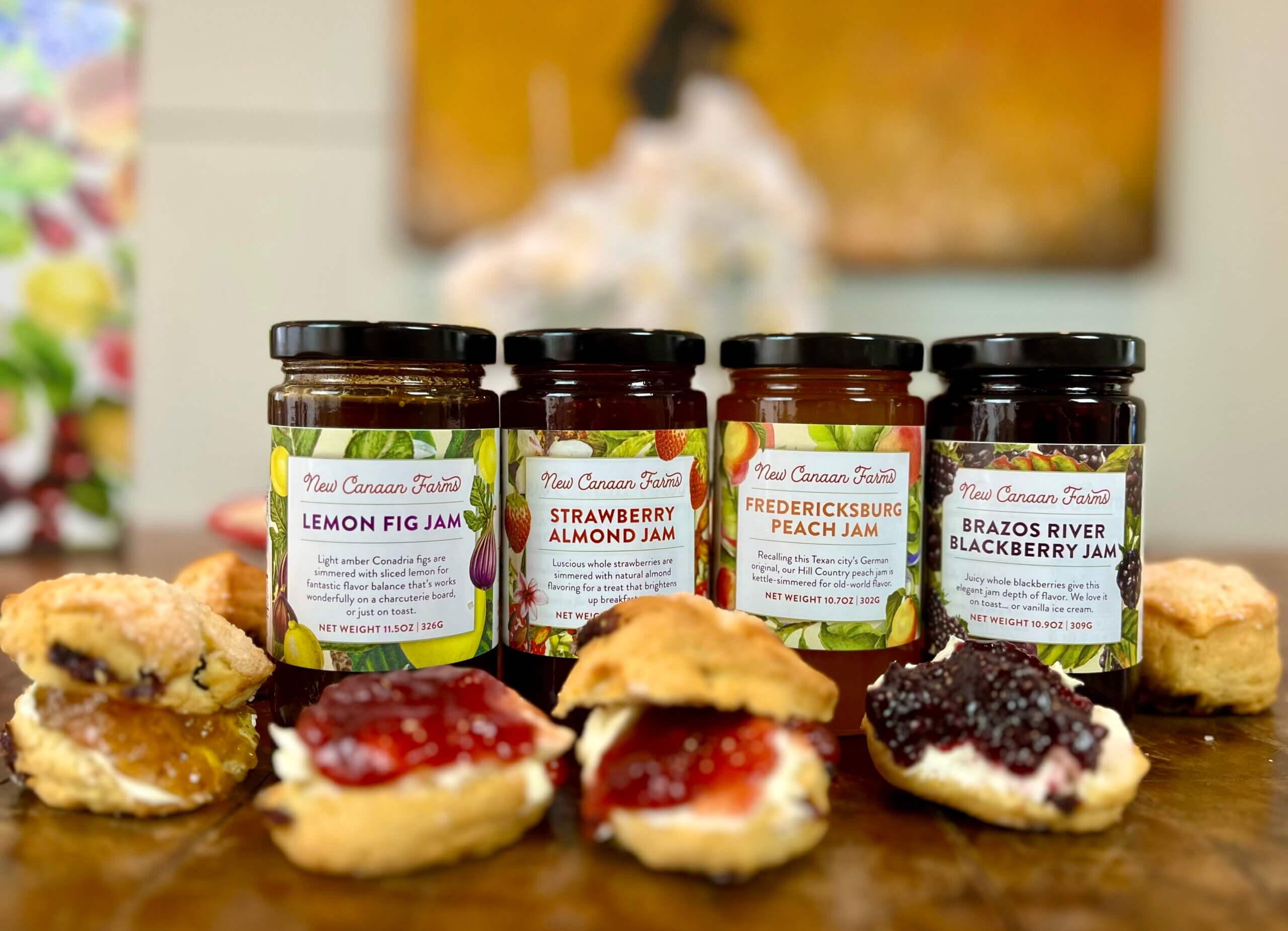 A selection of New Canaan Farm's sweet jam customer favorites: lemon fig, strawberry almond, Fredericksburg peach and Brazos River blackberry