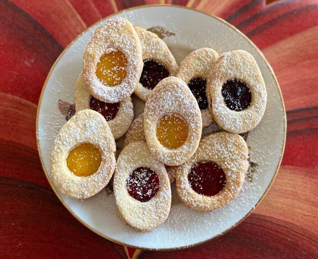 A plate of Easter egg cookies with a variety of New Canaan Farms jams