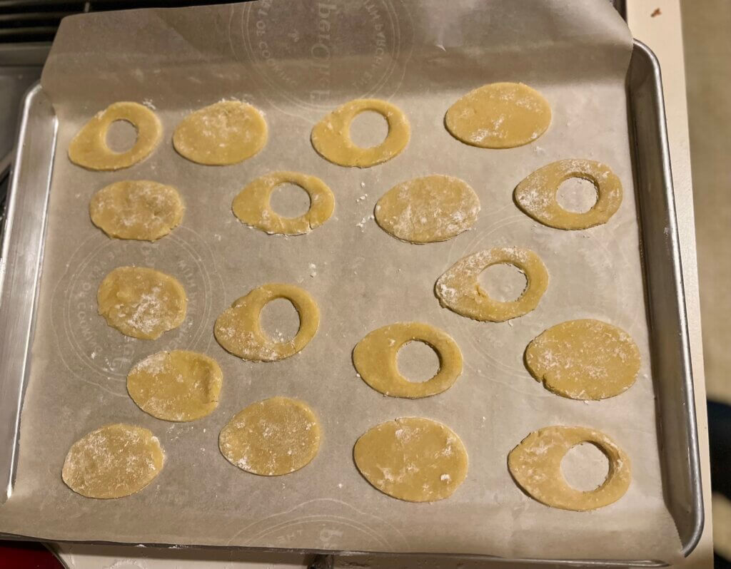 Easter egg-shaped cookies ready to go in the oven