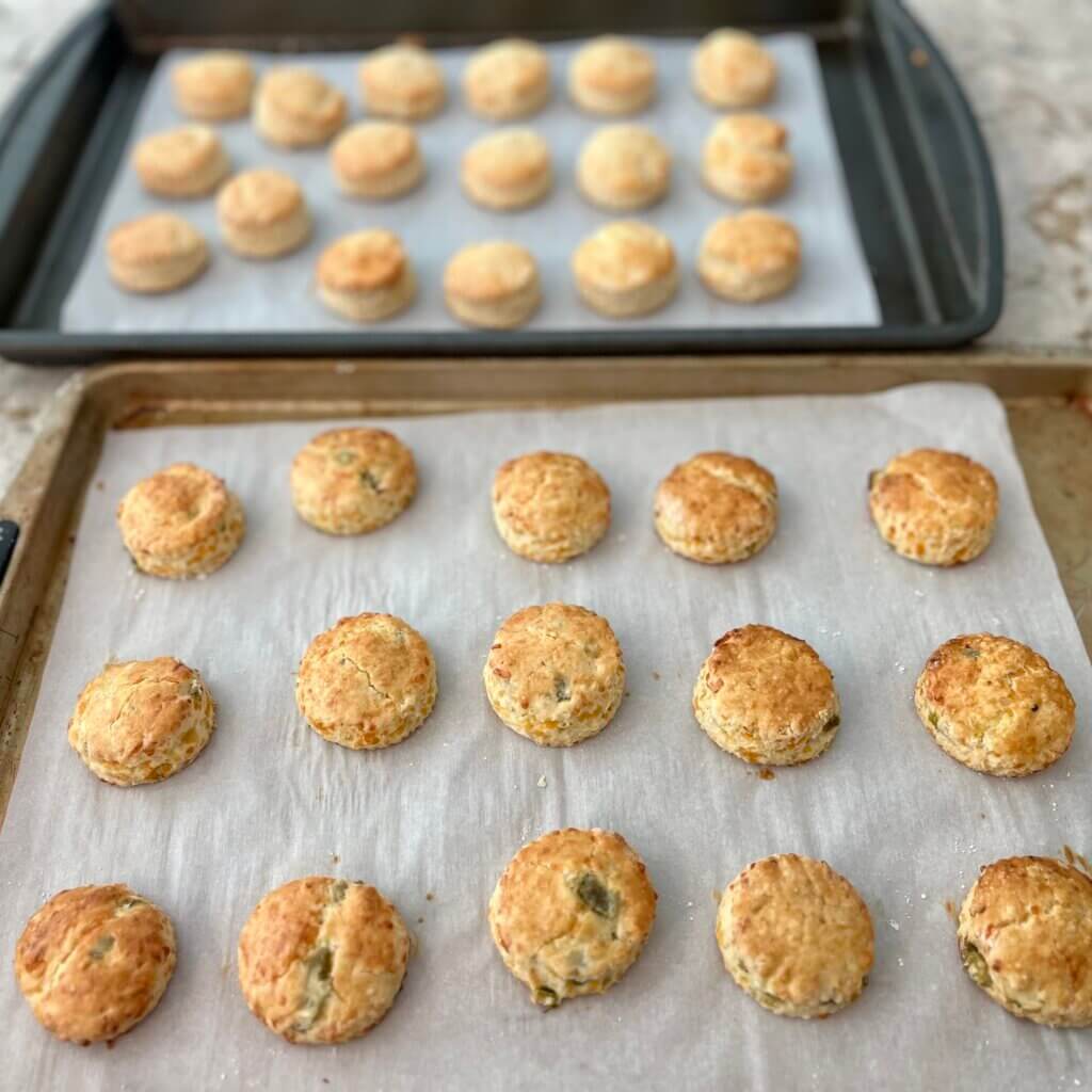 Two baking pans filled with cooked mini scones